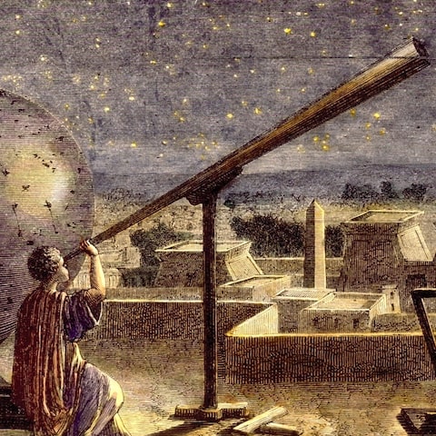 A figure looking through a telescope