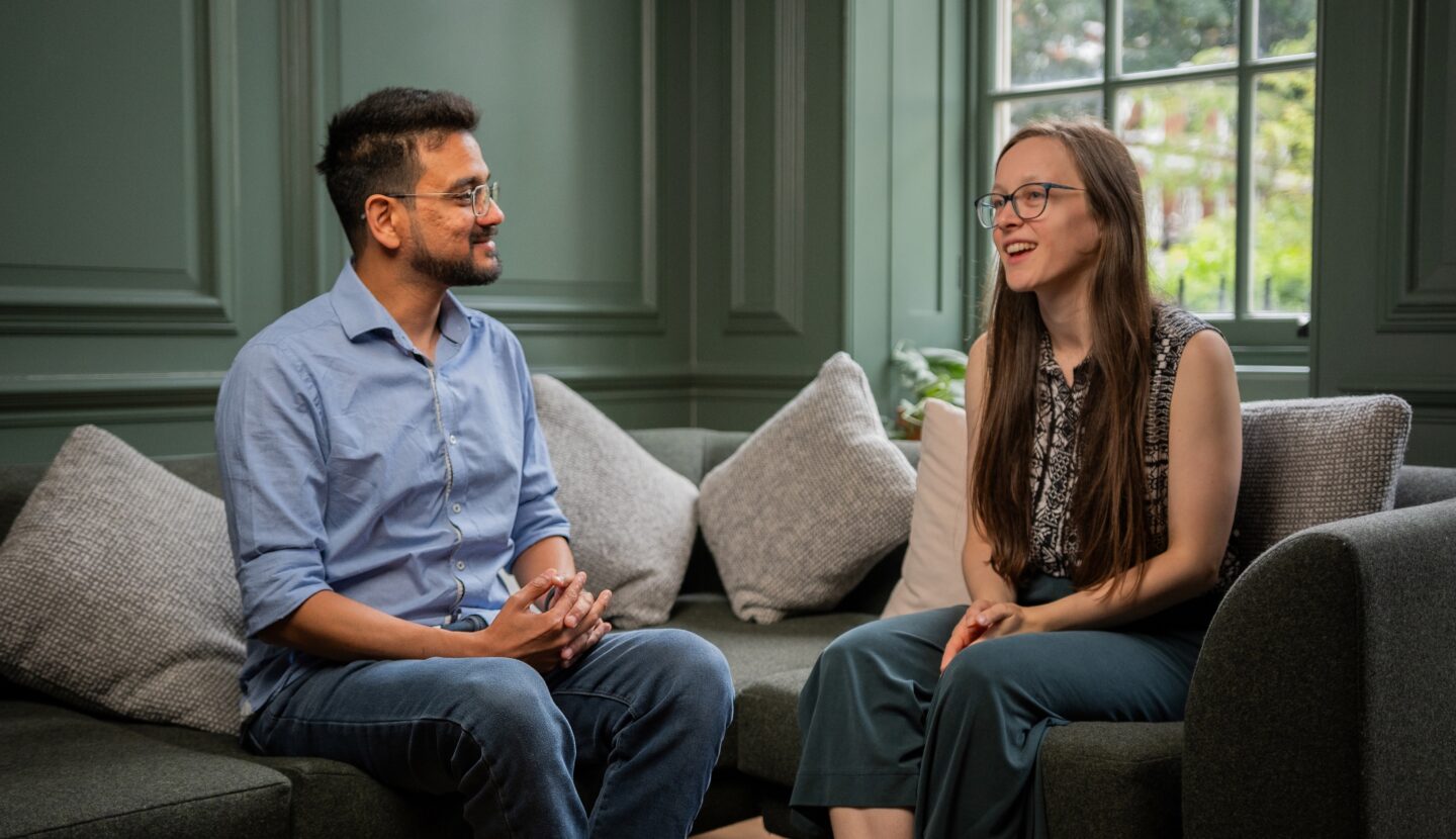 Advisor Sudhanshu speaking with woman